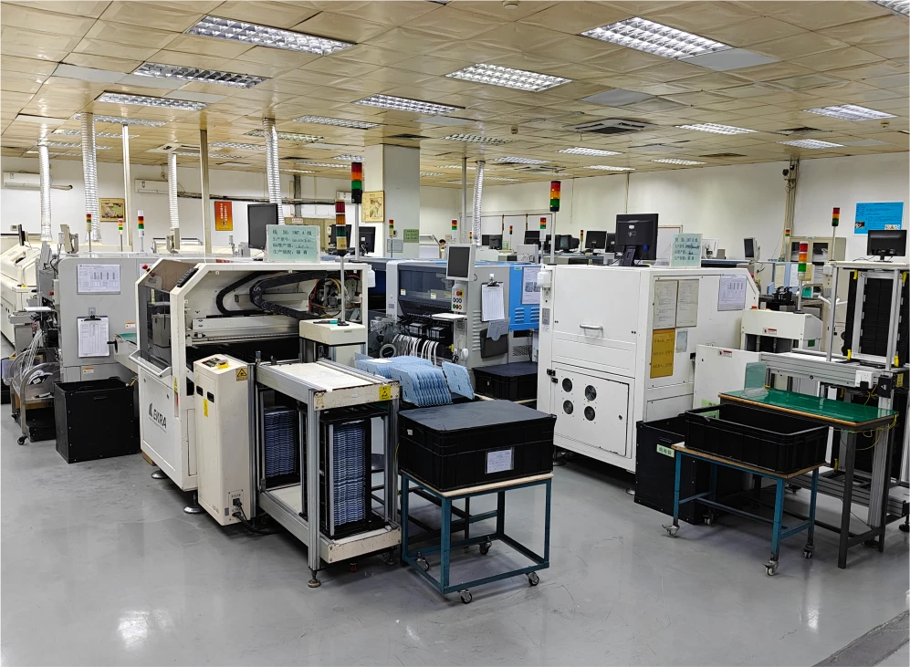Advanced SMT (Surface Mount Technology) workshop for headphone circuit boards.